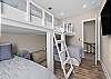 This 5th bedroom offers fun bunk beds, 2 sets of full over full custom built in bunk beds. 