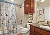 Hallway full bath. Shower/tub combo 