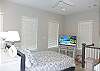 Loft queen room with a smart TV