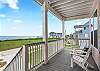 Enjoy beautiful sunsets & fantastic bay views from your shaded front porch.