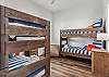 Two sets of twin over twin bunk bed room with en suite bathroom 