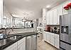Fully equipped kitchen with stainless steel appliances