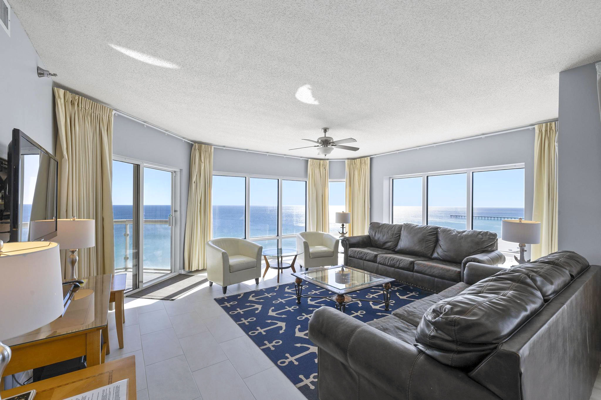 Emerald Isle 1508 is a corner unit, offering wraparound views of Gulf and island