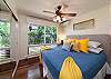 King bedroom includes split AC and ceiling fan to cool off from a long day of sight seeing.