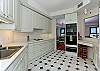 Kitchen has lots of cabinet and storage space with modern features.