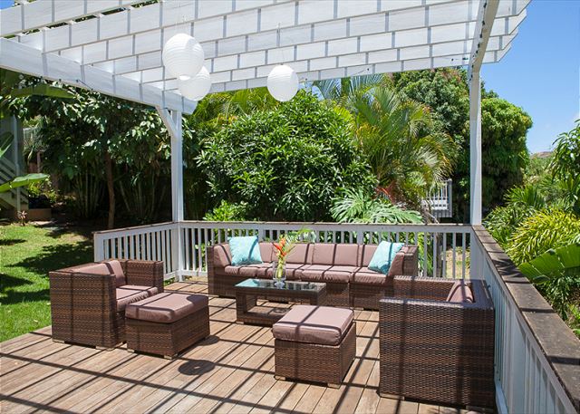Free-standing Lanai makes for a wonderful barbecue and entertainment deck - surrounded by tropical foliage.