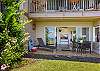 covered lanai to relax on, includes roll down shades for privacy and comfort