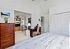 King bedroom with sitting room and tv