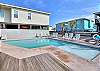 Community pool with outdoor seating