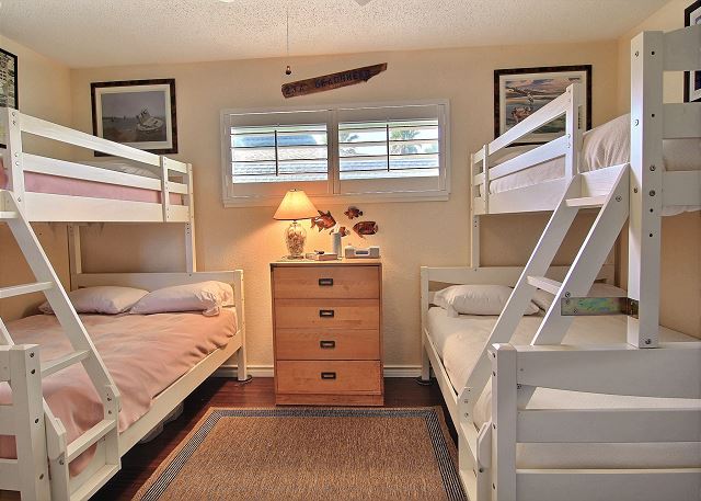 Second bedroom with two twin over full bunk beds.