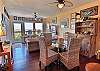 Open and airy living room and dining space.