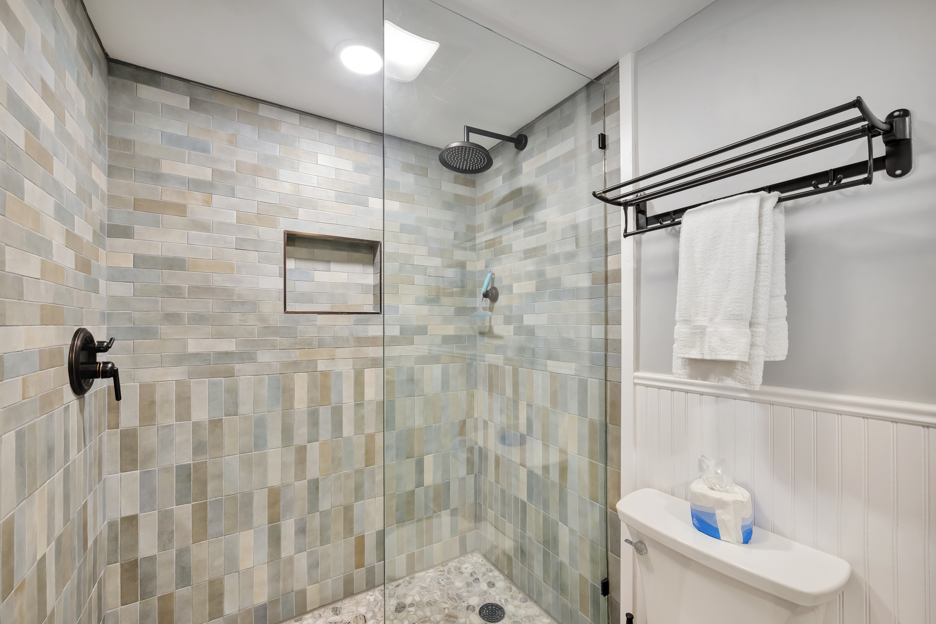 Rinse, refresh, and get ready for more island adventures in this beautiful walk-in shower.