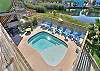 Aerial view of private pool and pond