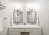 bright, modern double-sink bathroom vanity with a clean and minimalist design