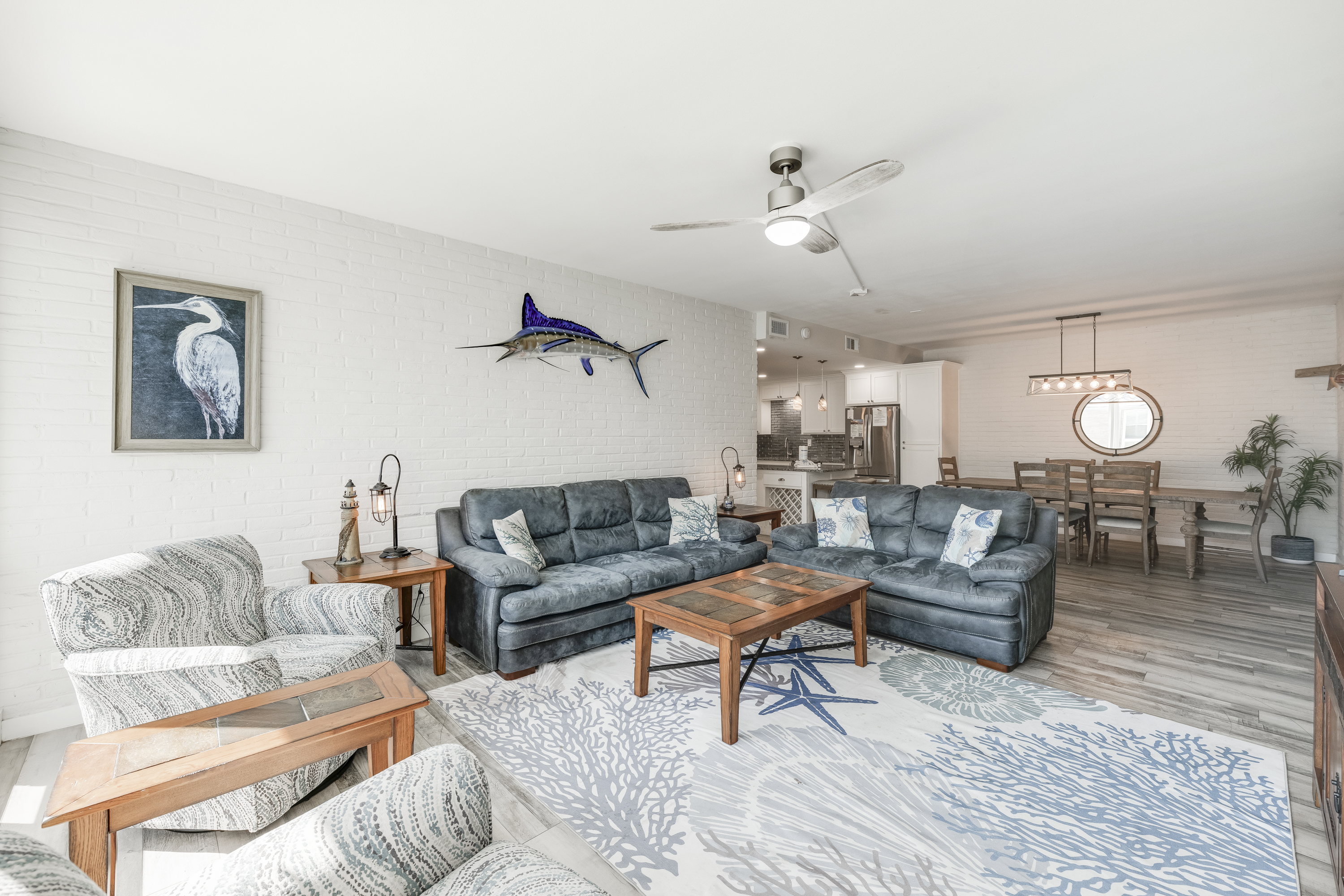 Bright, coastal-style living and dining area with a relaxed and inviting atmosphere