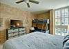 King bedroom with a twin over full bunk bed