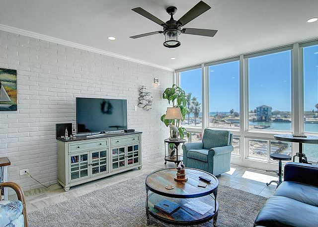 Spacious Living Area With Beautiful open windows