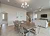 Timeless dining area with coastal charm and elegance