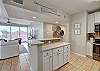 Breakfast bar and well-equipped kitchen