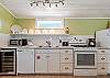 Kitchen with gas range stove