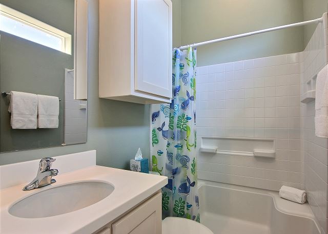 Long day at the beach? There are 4 full bathrooms for you to chose from to get a good rinse