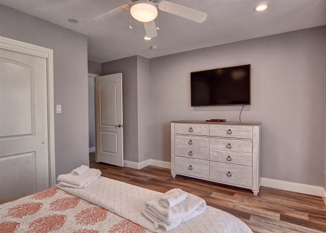 Other view of bedroom with queen