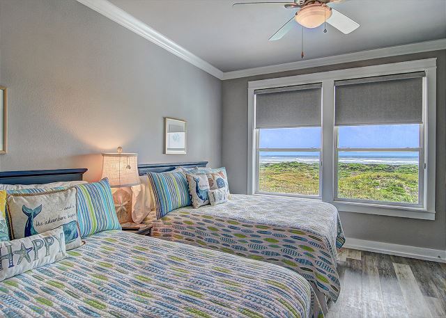 Double queen bedroom with views of beach 