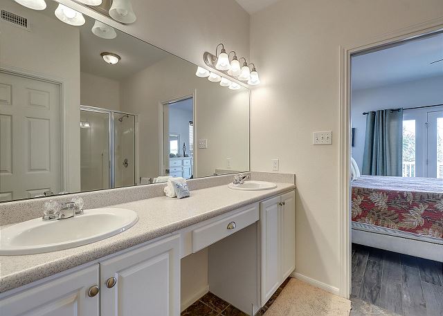 King bedroom's en-suite bath with double vanity spaces