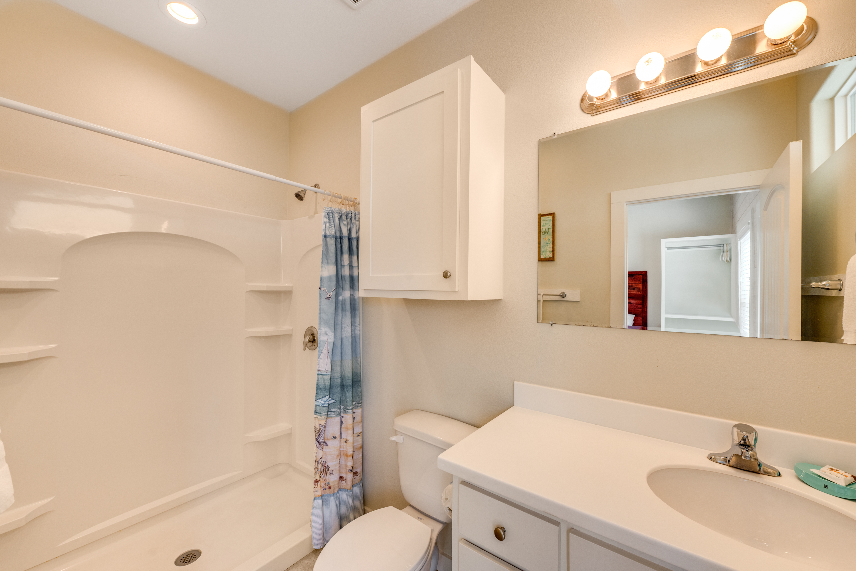 Private ensuite bath that offers both comfort and convenience