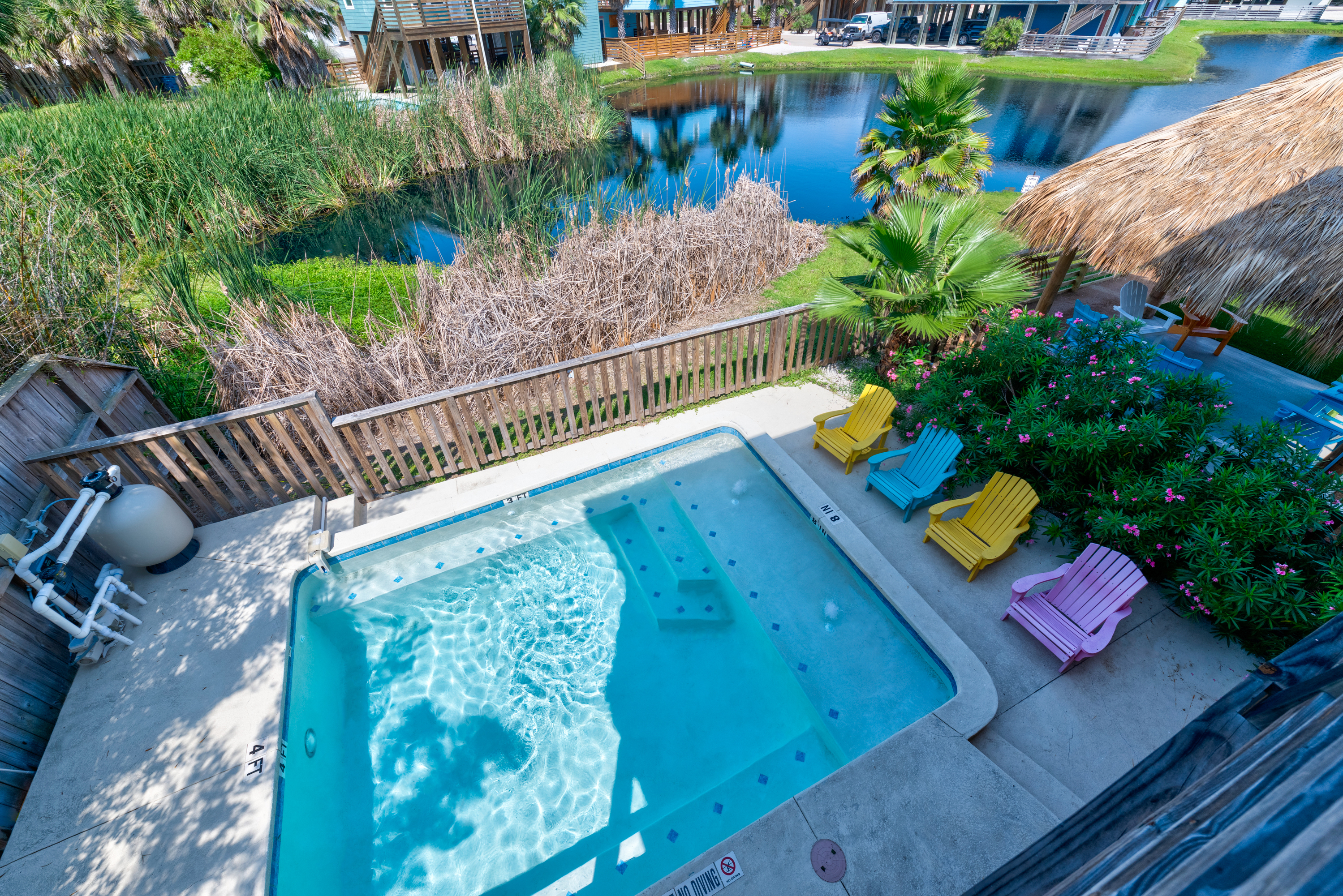 View of the pool from the upper deck back patio