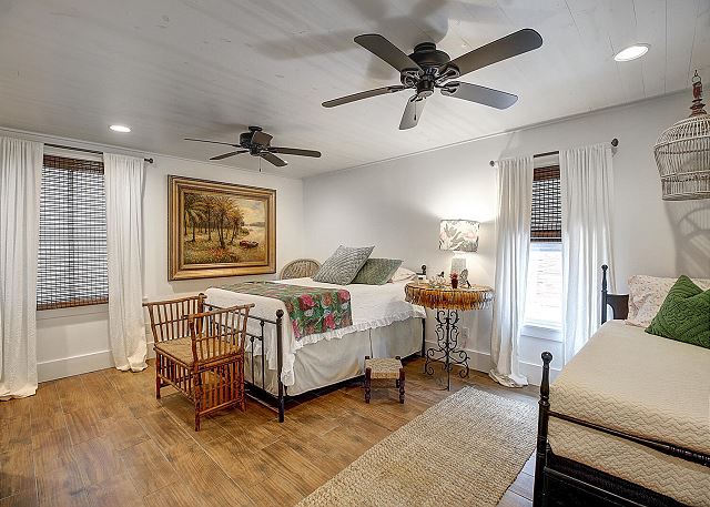 bedroom with twin and a full