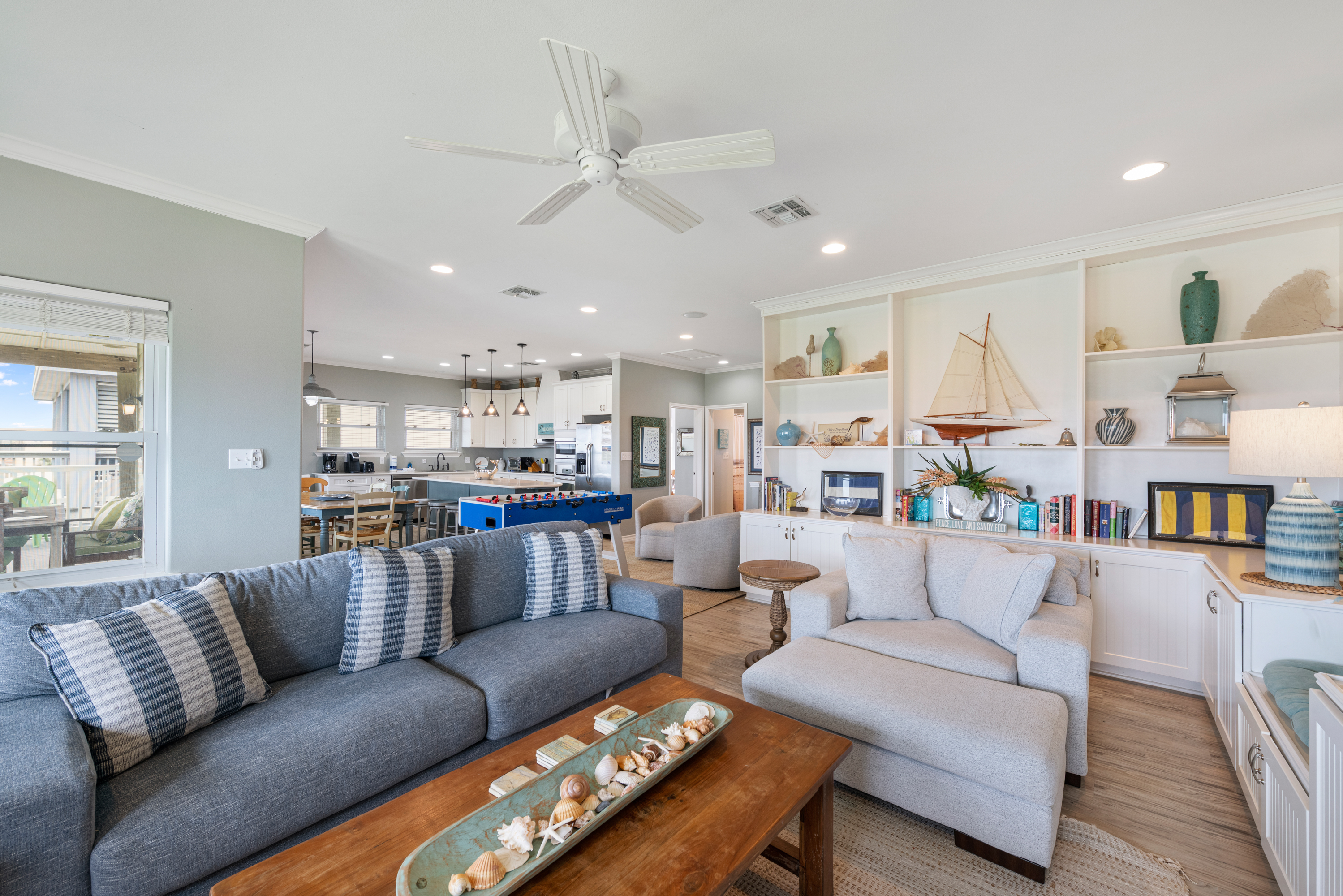 Spacious & Sunlit: Flowing Living, Dining, and Kitchen Areas 