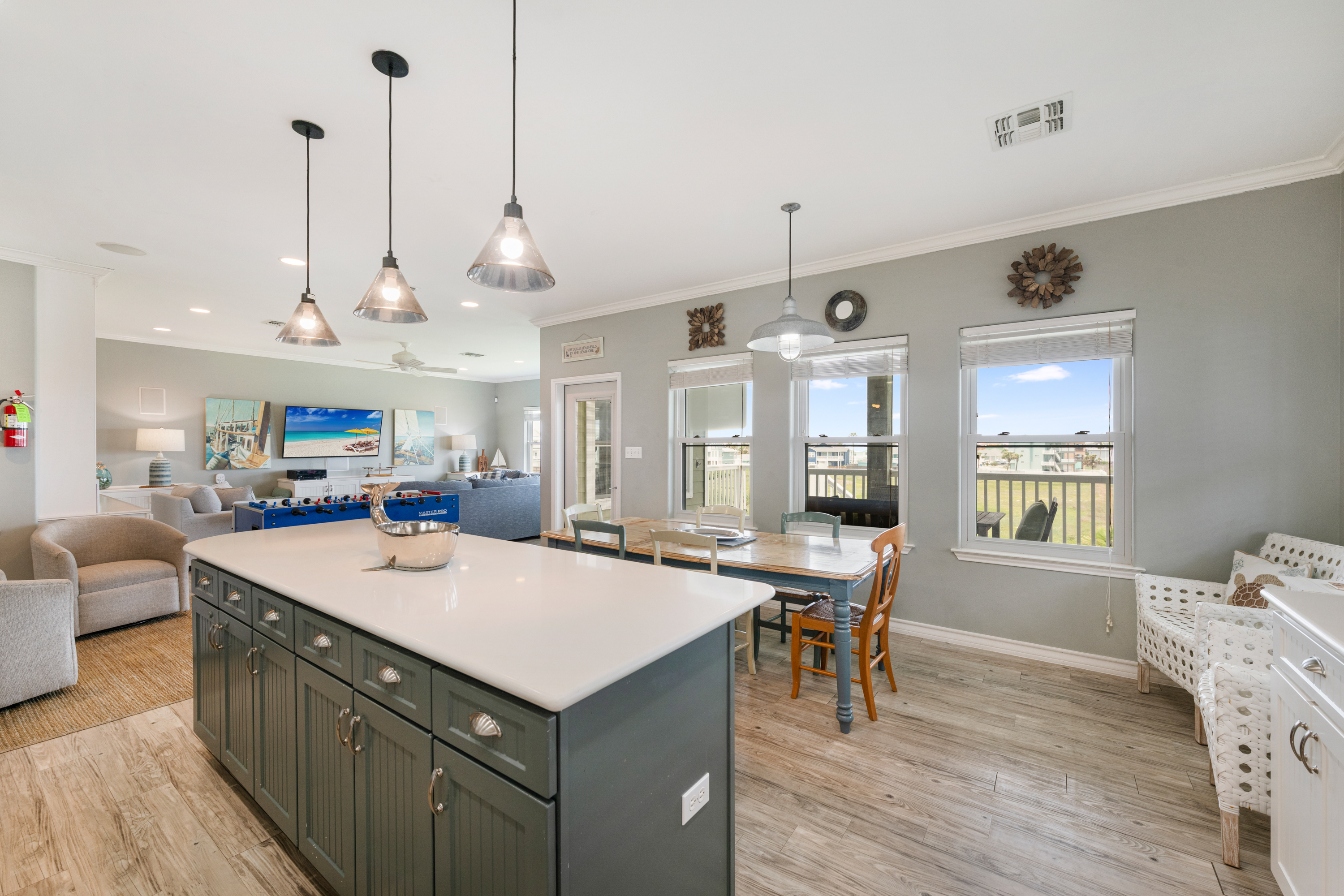Enjoy this bright, open kitchen with a generous island — the perfect spot for easy meal prep and laid-back coastal living.