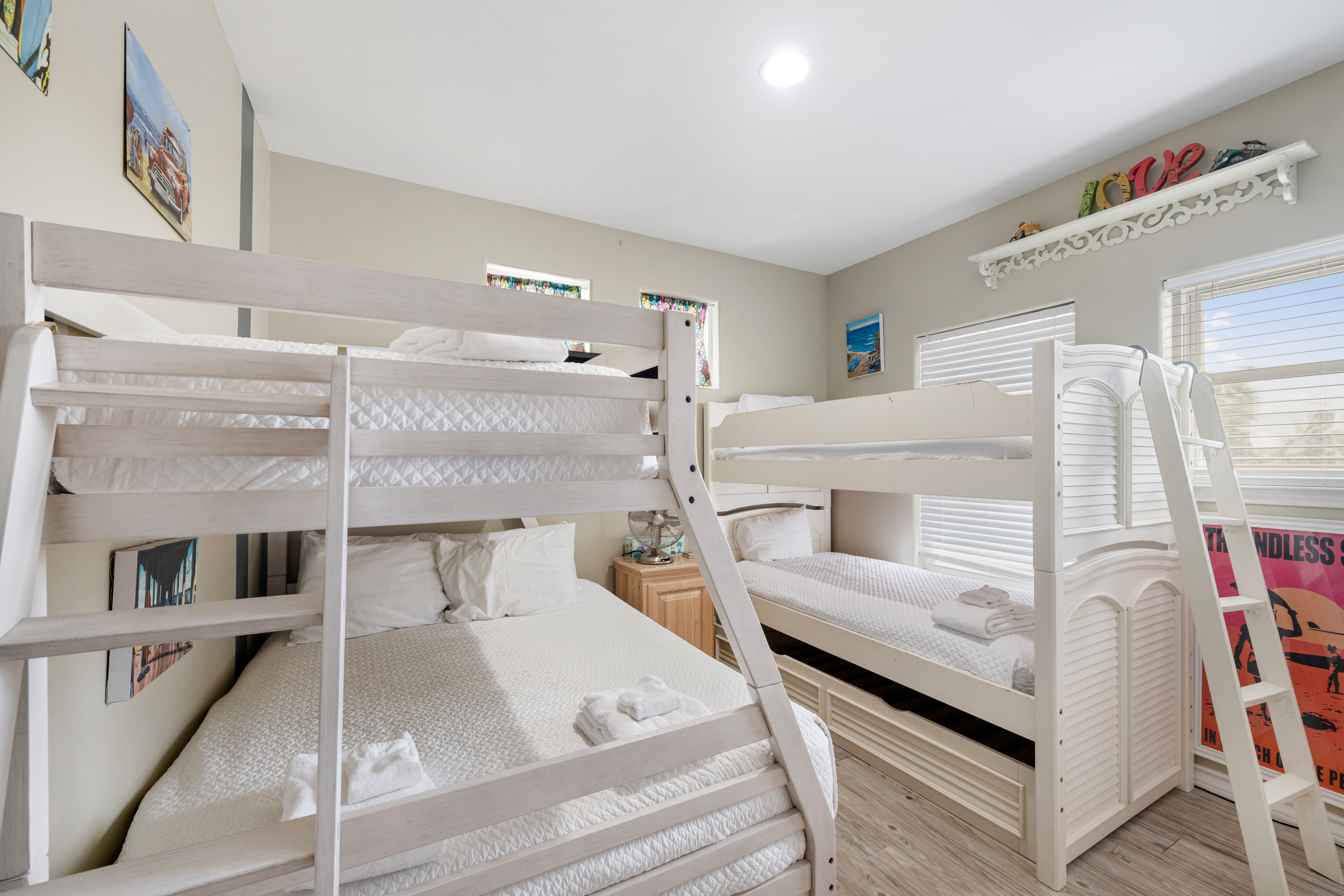 Comfortably designed for families or groups, offering one set twin over twin, one set twin over full and a TV