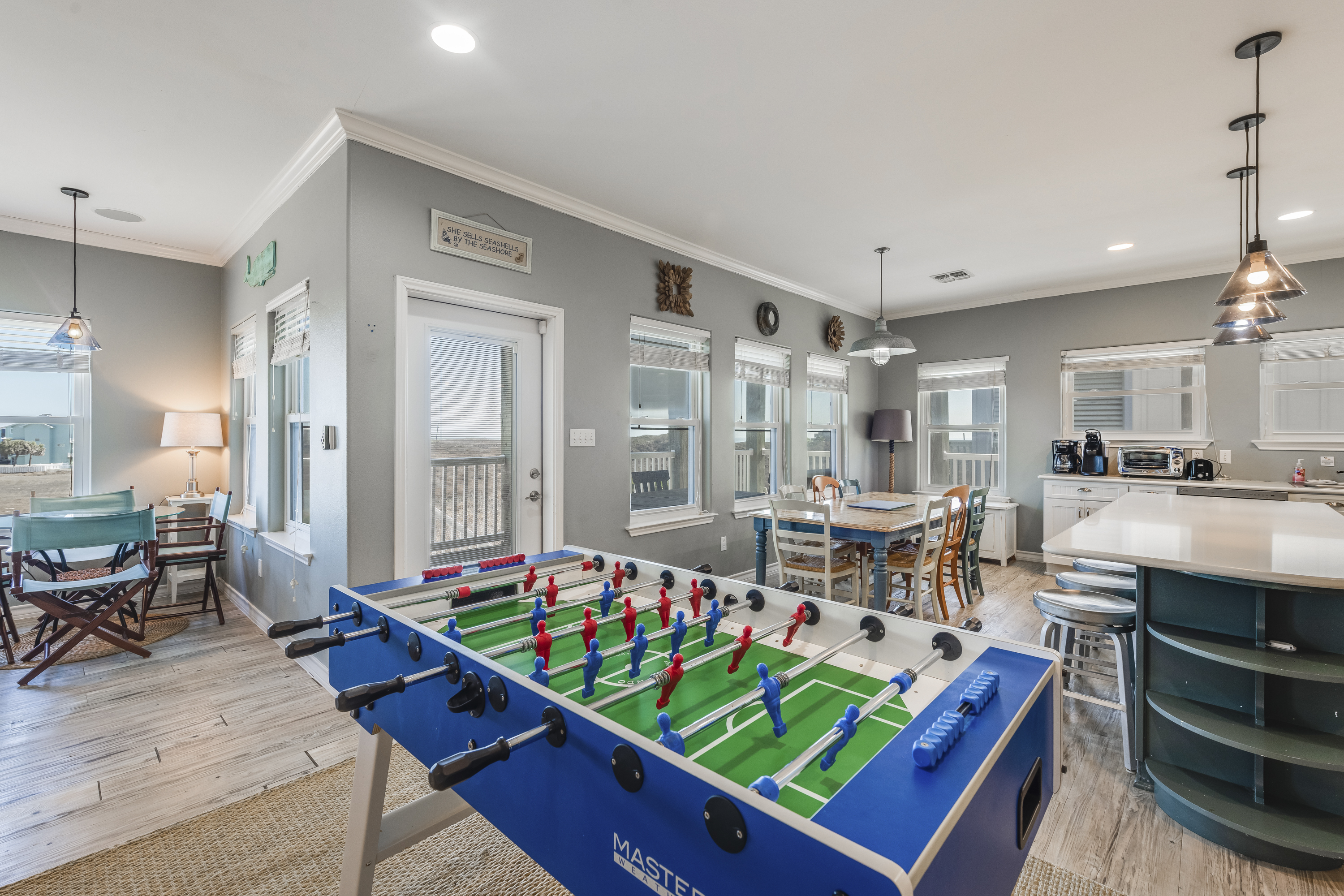 Third floor Family Hub includes foosball table. Where fun and relaxation meet — game on! 