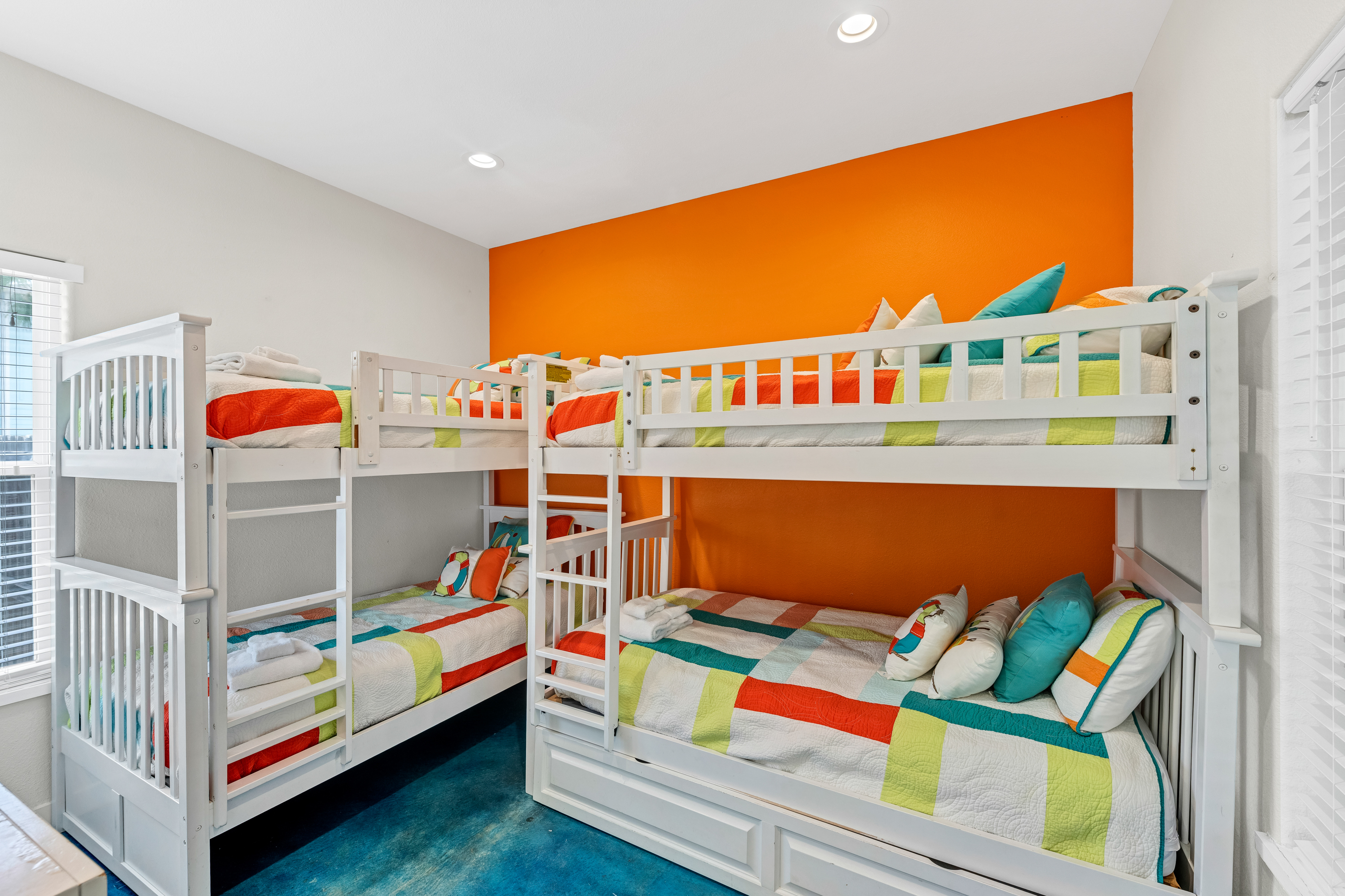 Cozy Bunks for Big Groups featuring 2 sets of twin over twins and 1 twin trundle- Sleeps 5