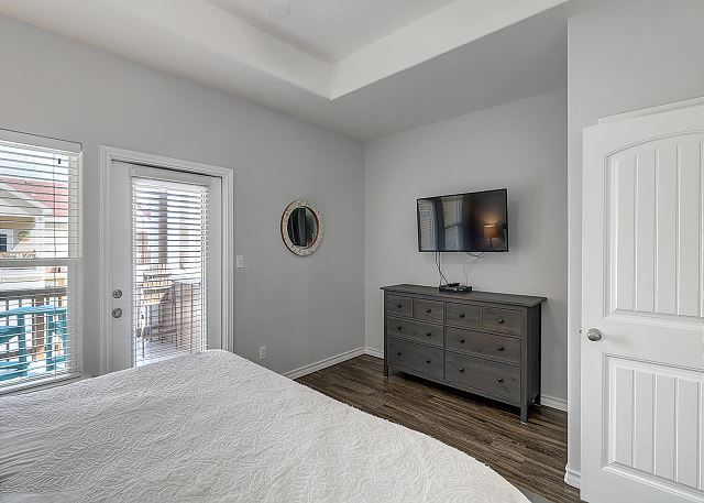 2nd King Bedroom with door to patio