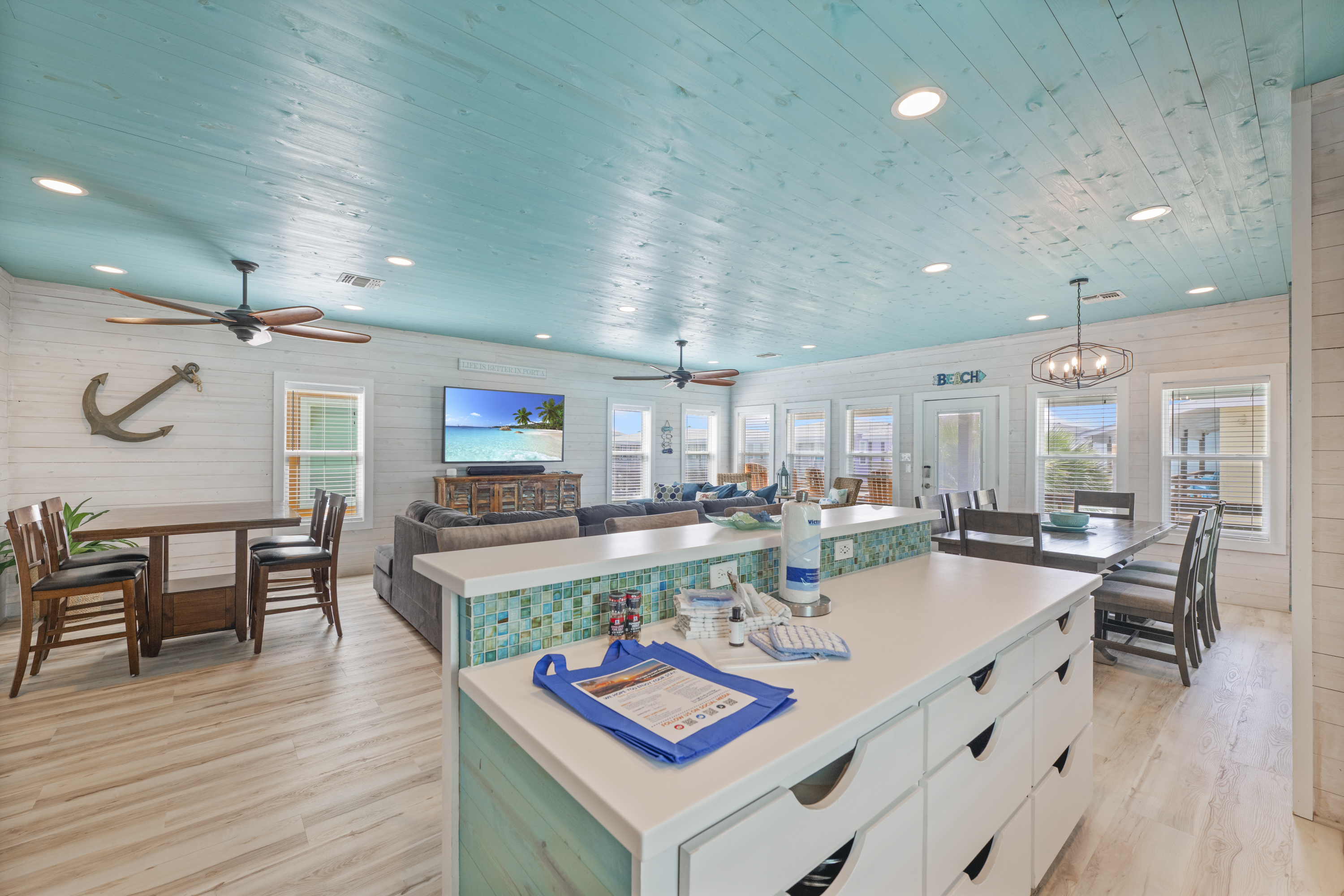 The open-concept kitchen flows seamlessly into the living area, making it easy to cook and stay connected with family and friends. The breakfast bar provides additional seating—perfect for morning coffee, quick meals, or chatting with the cook while dinne