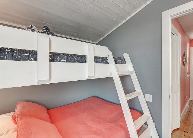 Twin over full bunk beds with built in reading lights