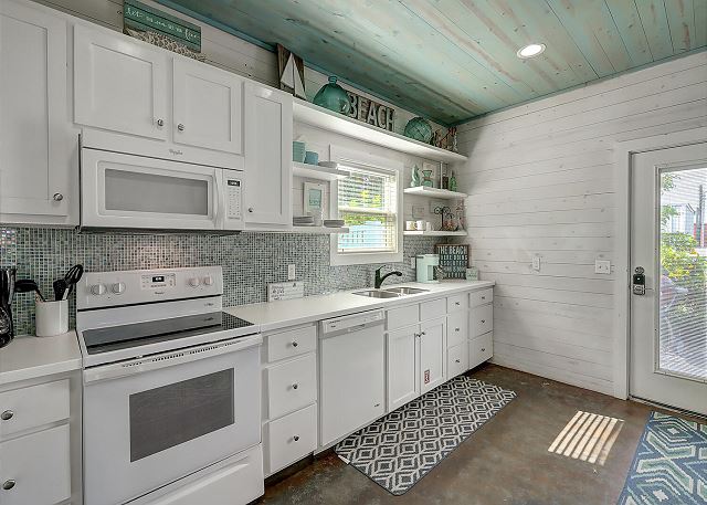 Kitchen adorned with beach themes