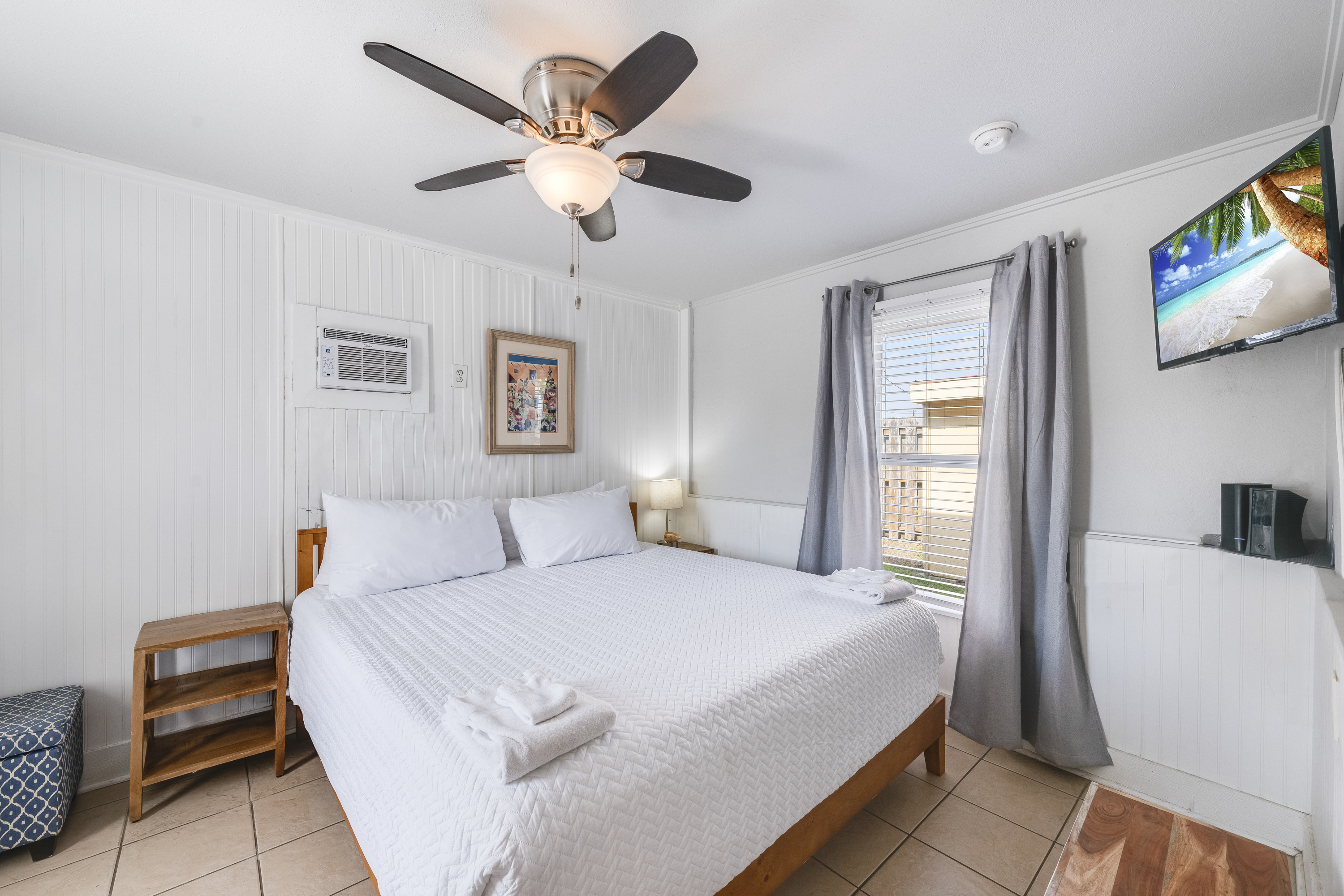 Drift off to the sound of island calm in your king suite