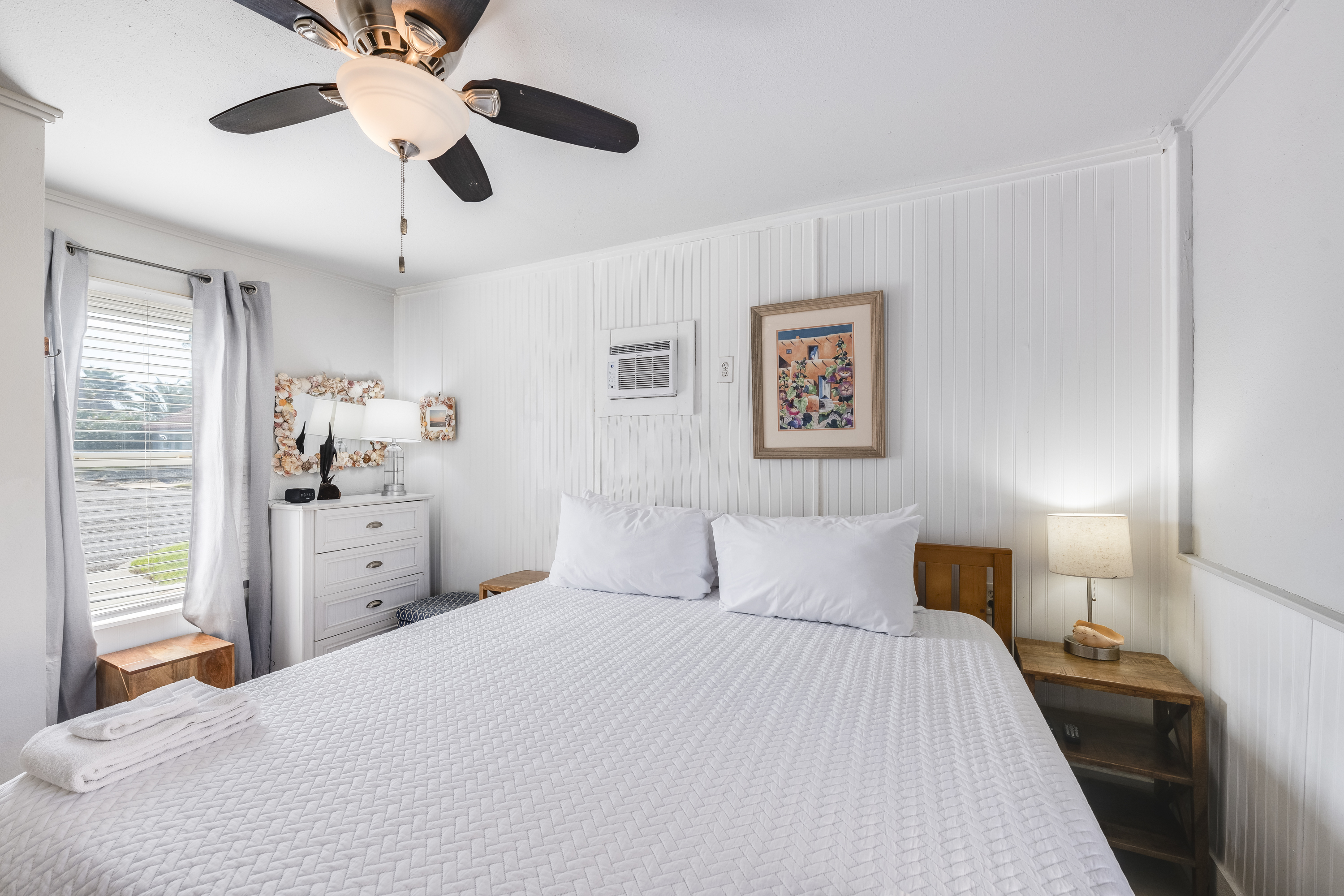 Bright and airy king bedroom designed for comfort and relaxation