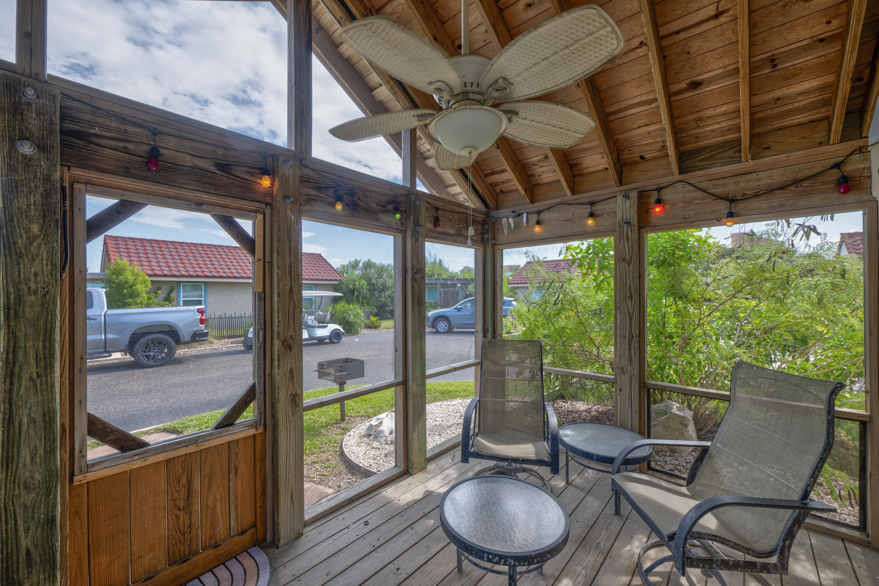 Soak in the coastal charm from your screened in patio with a outdoor charcoal BBQ