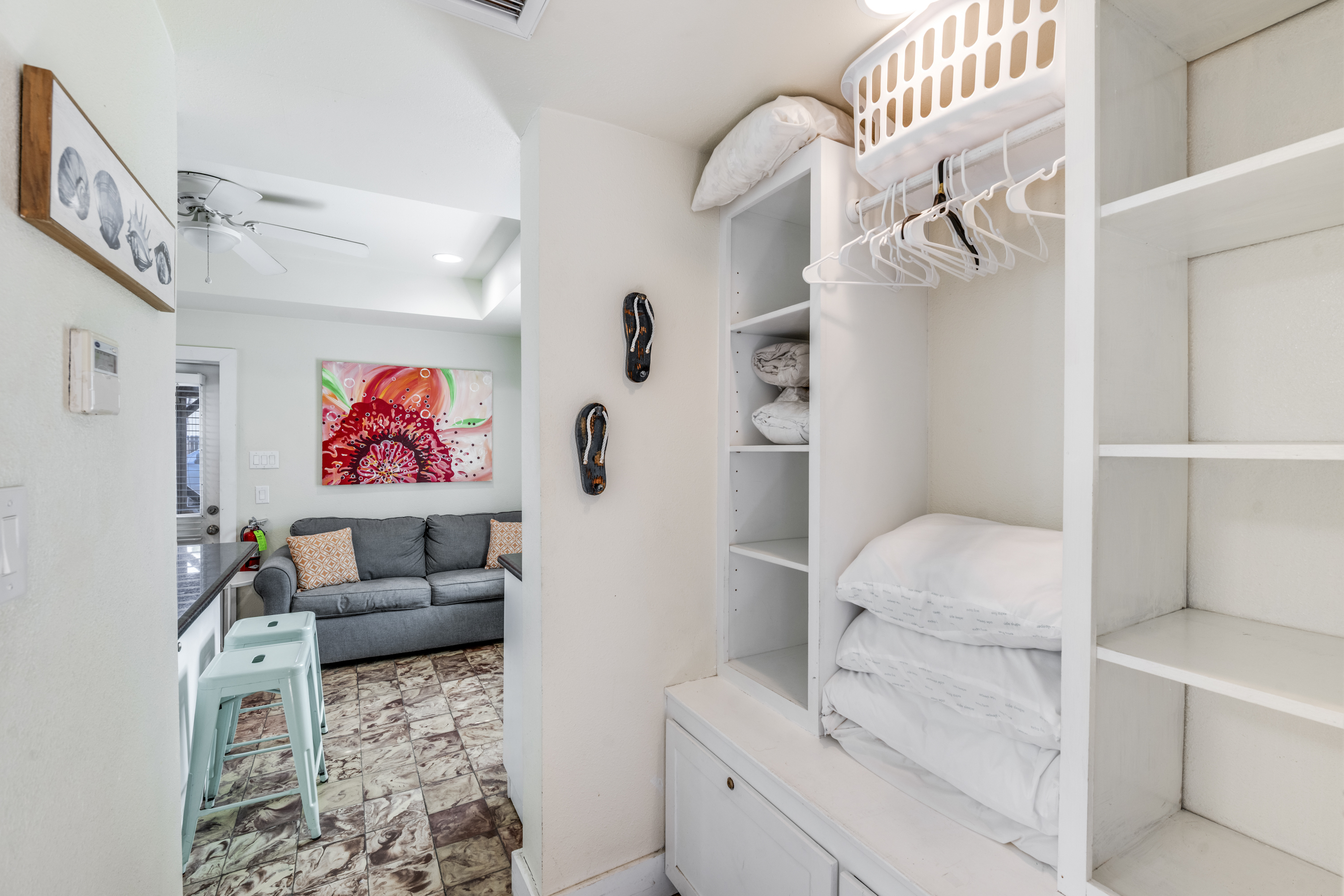 Plenty of shelving and storage space in the hallway