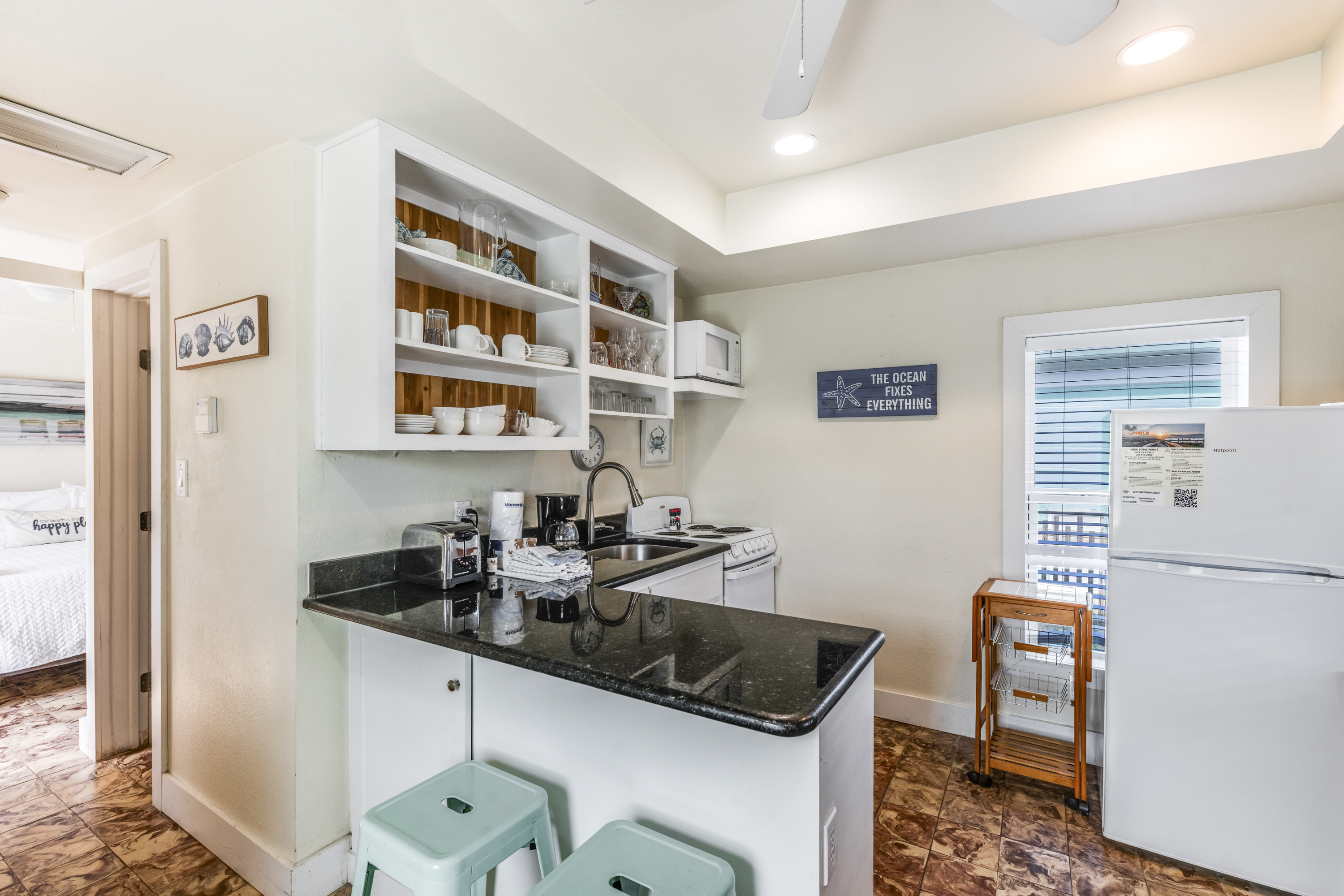 This small kitchen is designed for delightful meal preparation during your perfect getaway
