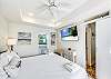 King suite with flat screen TV and coastal decor