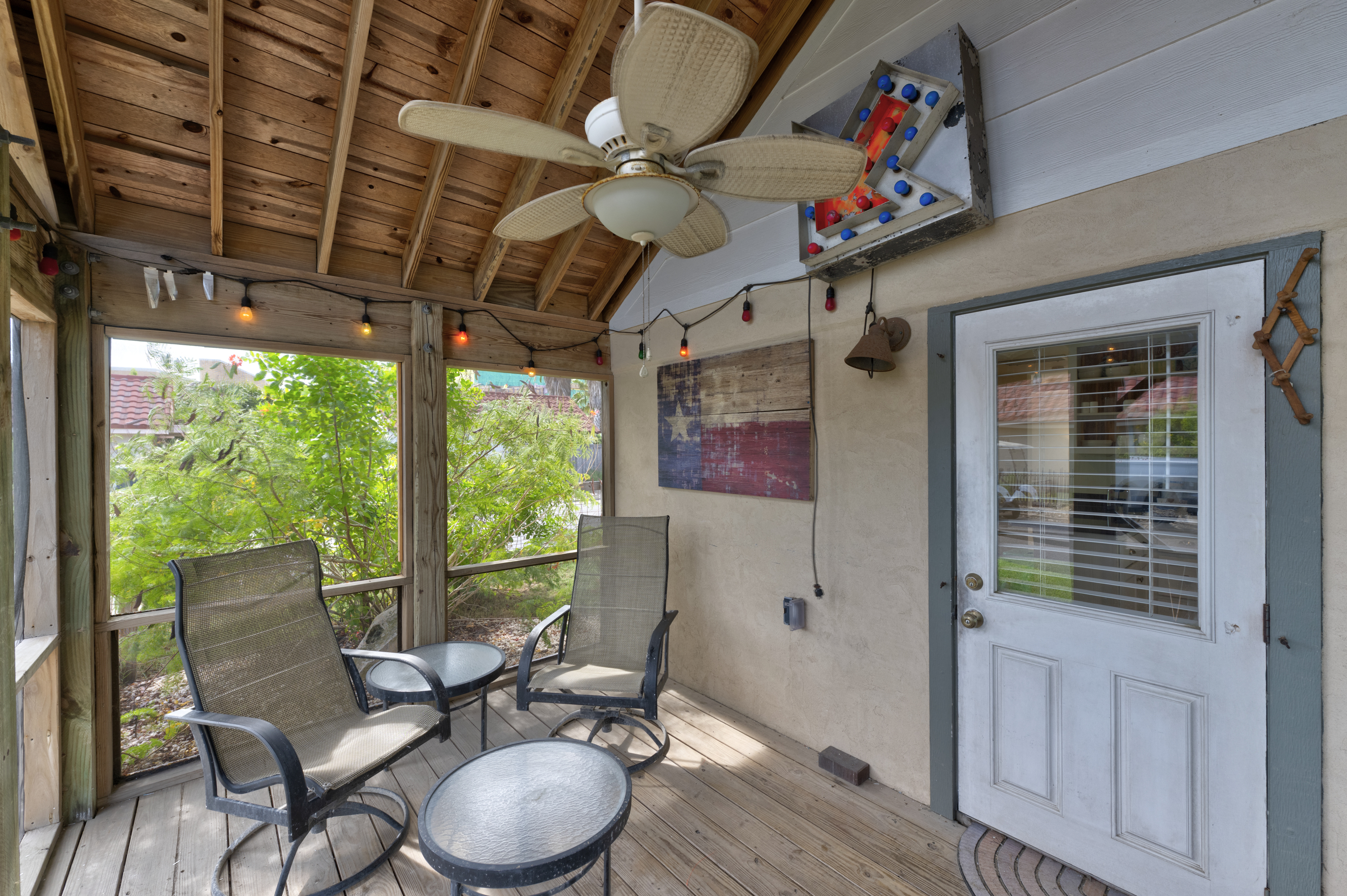 Enjoy your morning coffee in this cozy screened in patio