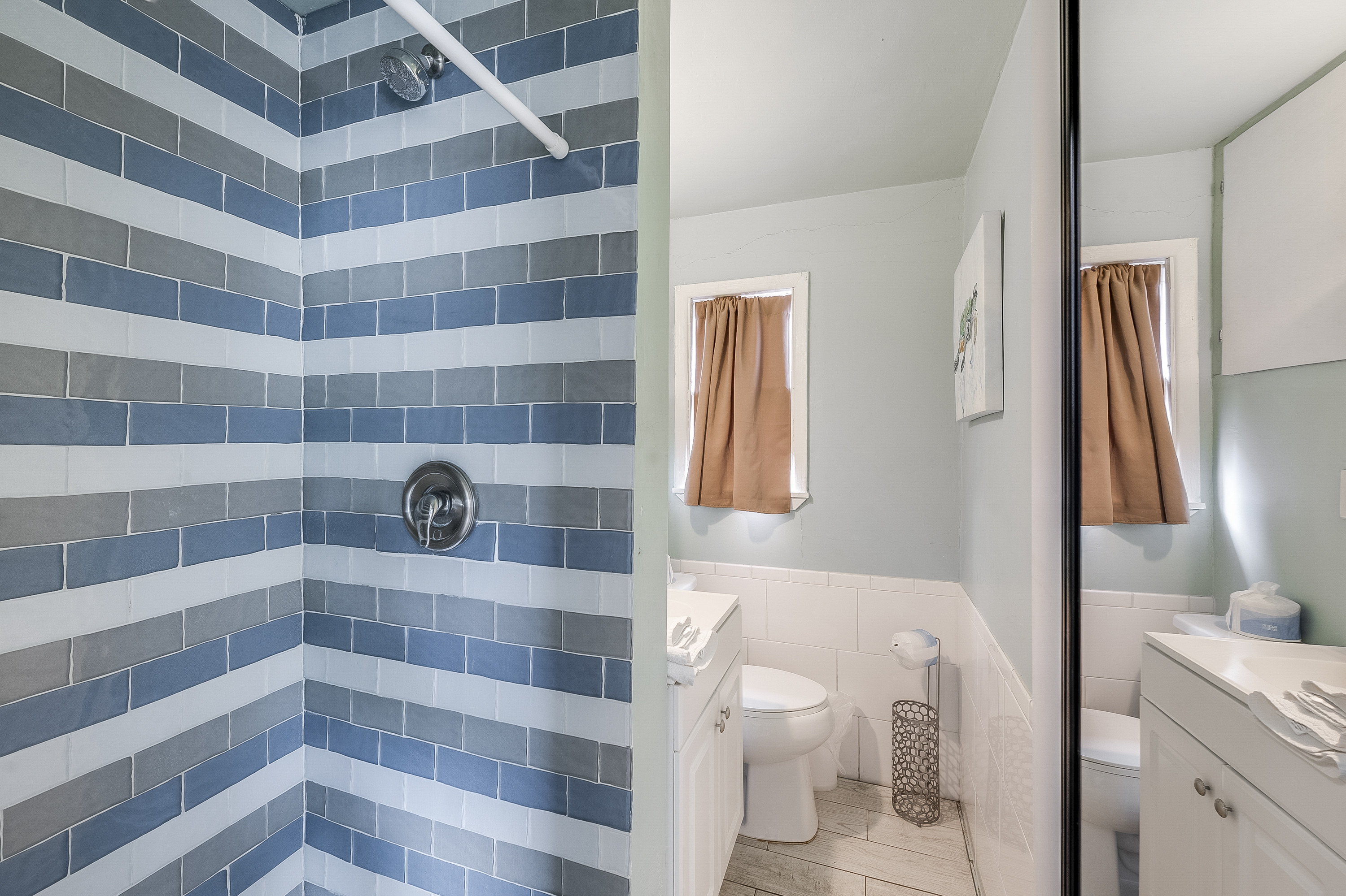 Bright mornings start here featuring a low-step entry shower