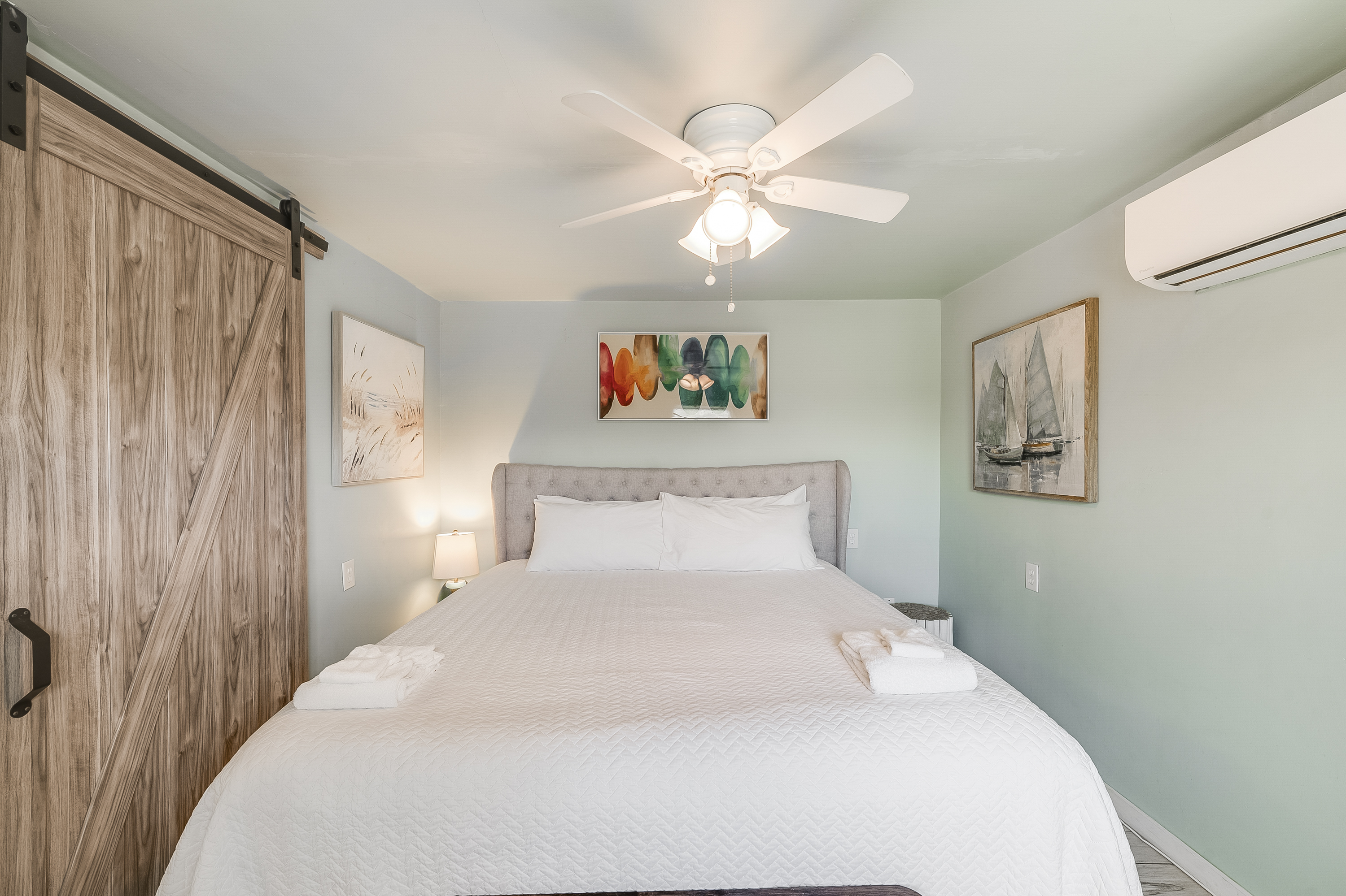 “Sleep easy surrounded by soft hues and beachy vibes.”