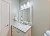 Shared bathroom with single vanity